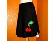 Black cotton dropped waisted skirt lined in a bright red at